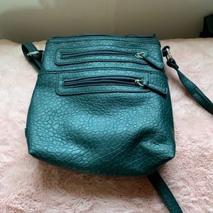 Hunter green. Cross body.